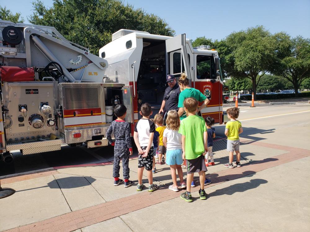 kids touring a fire station