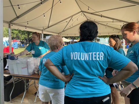 Volunteers in Blue Shirt